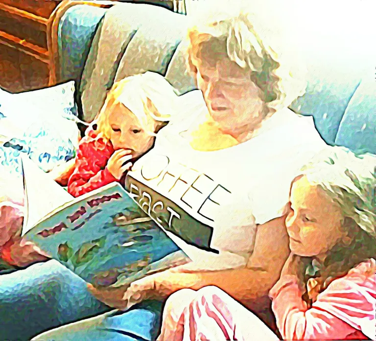 Woman reading a book to girls